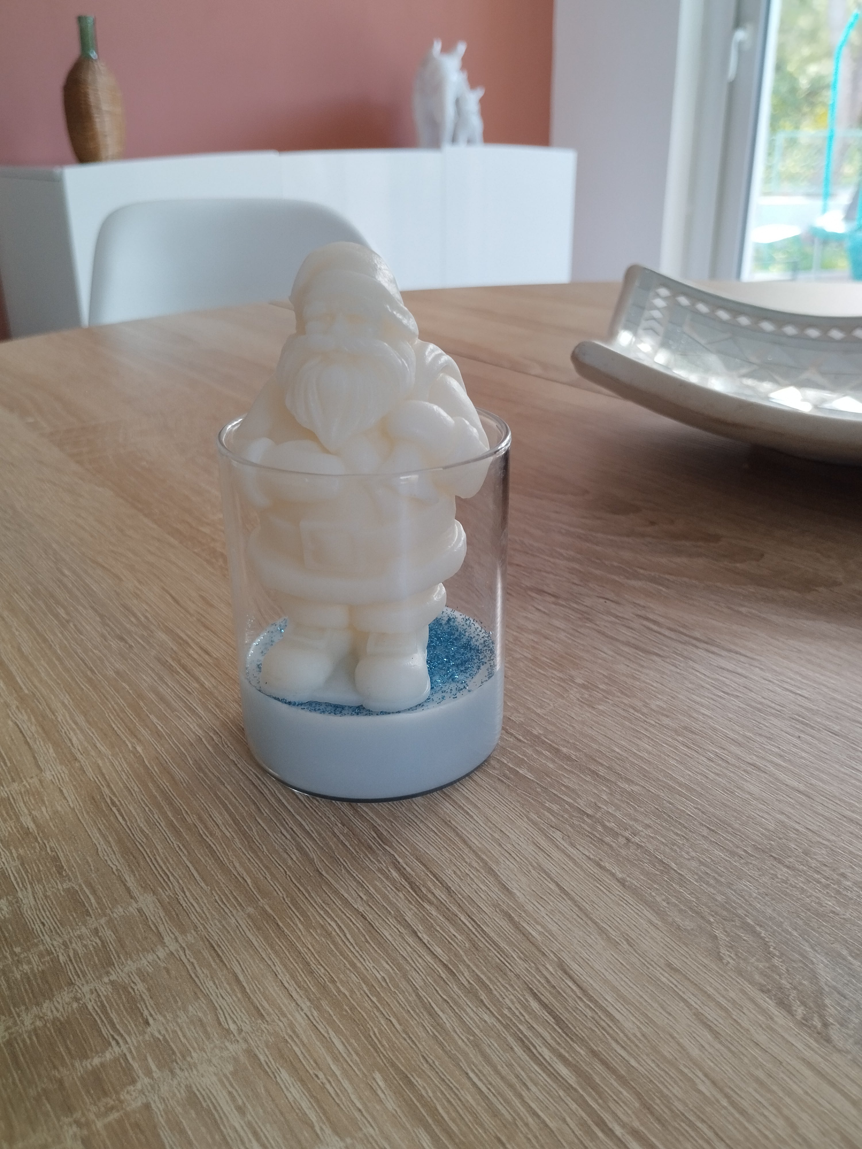 Bougie Papa Noël sur la neige